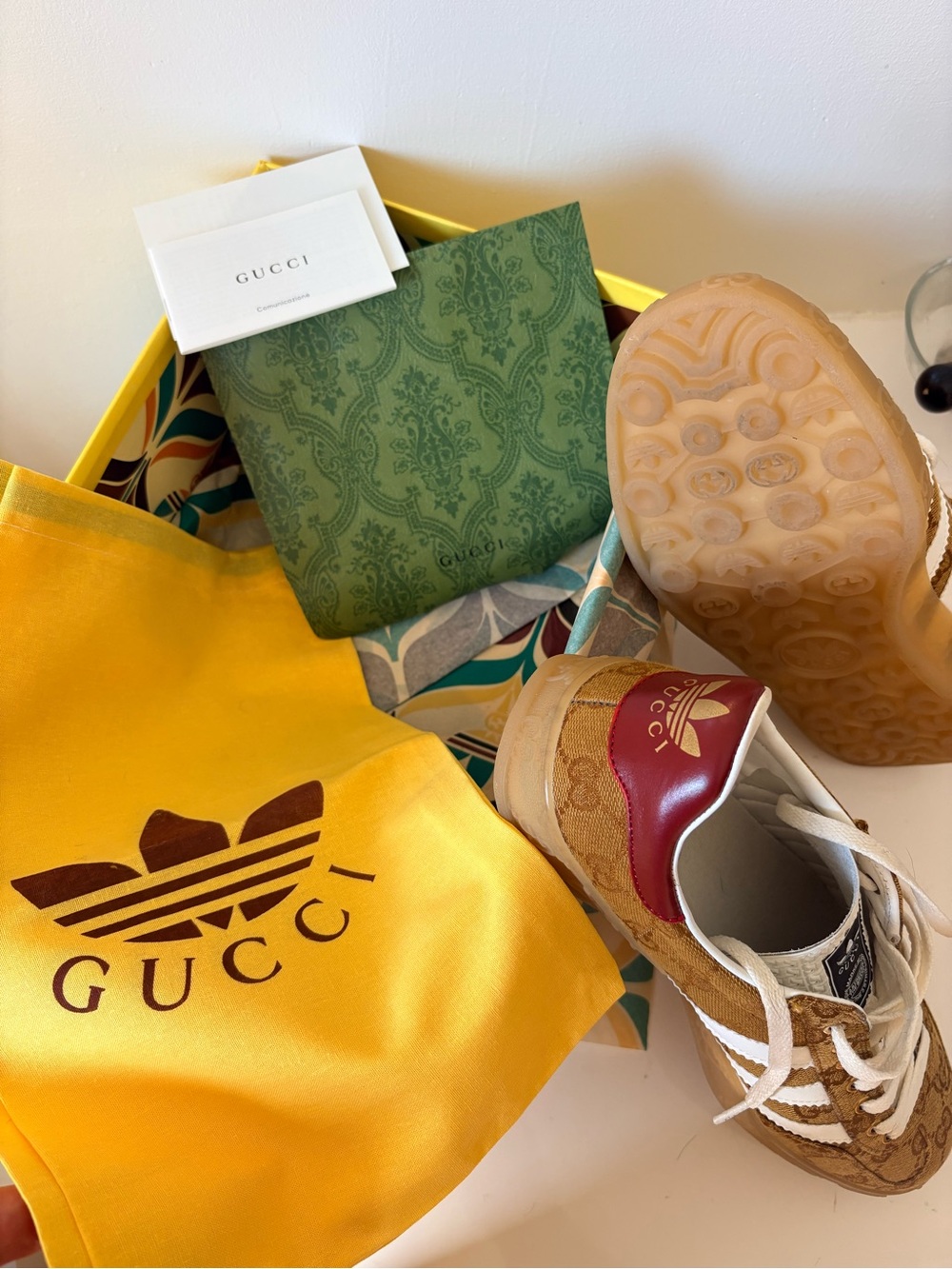 Gucci x adidas Gazelle Beige Monogram Sneakers with White Stripes and Red Heel